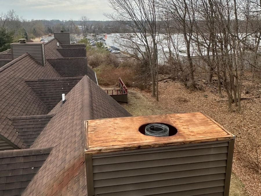 Professionally cleaned chimney on a Connecticut home — Chimneys Empire
